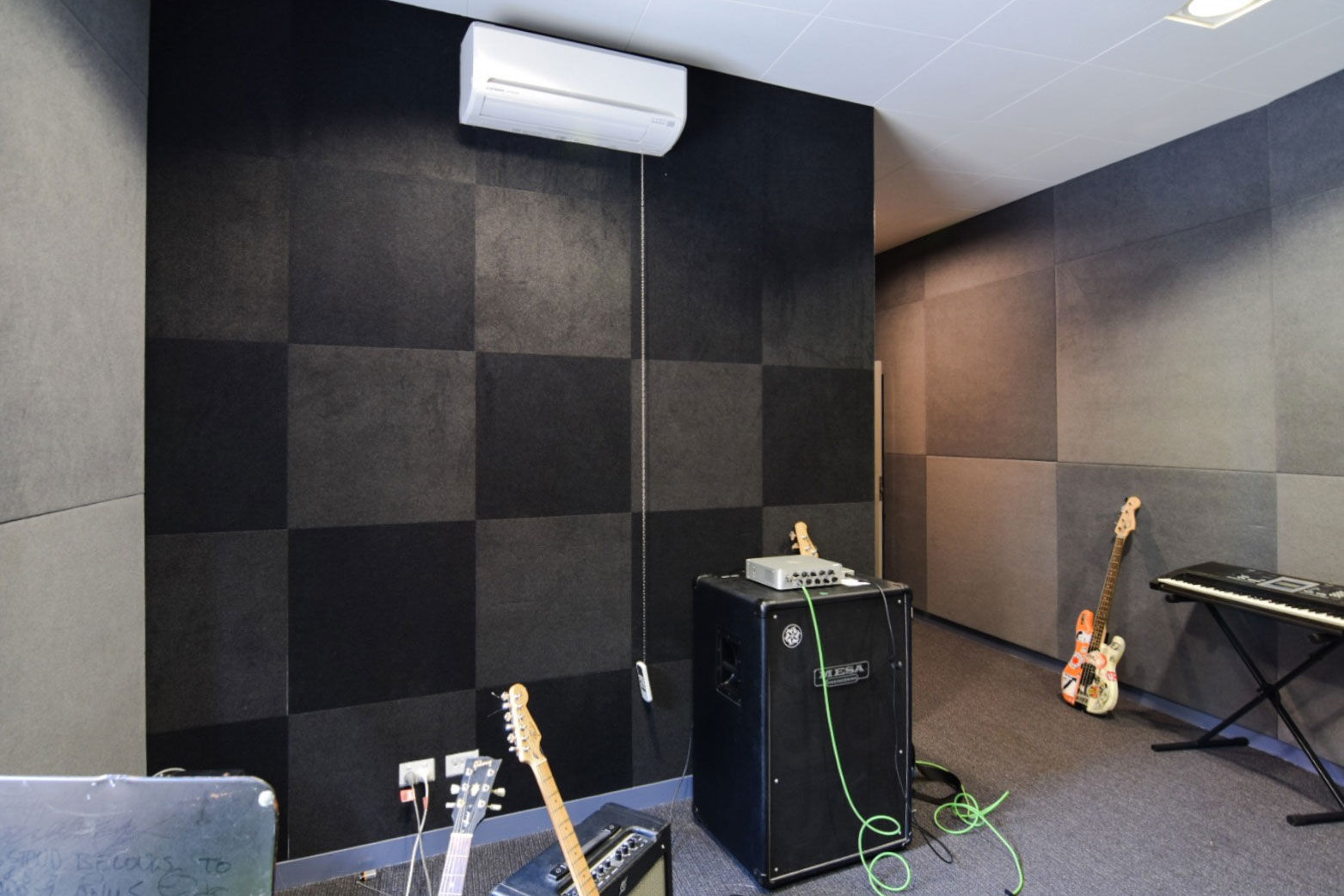 Music room with instruments and acoustic panels